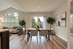 Brighton apartment for rent - A dining room with a table set for four.