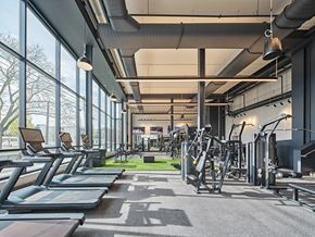 Birmingham townhouse for rent - A gym with treadmills, weights, and exercise equipment.