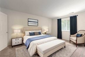 Waterford apartment for rent - a bedroom with a bed and a chair