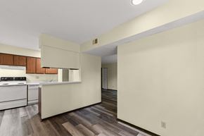 Peoria apartment for rent - A kitchen with a white stove top oven and a white counter top.