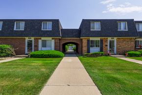 Southfield apartment for rent - A row of houses with a walkway in the middle.