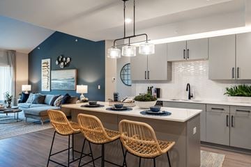 Canton apartment for rent - A modern kitchen with a dining table and chairs.