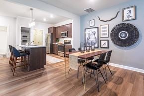 Commerce Township apartment for rent - a dining room with a table and chairs