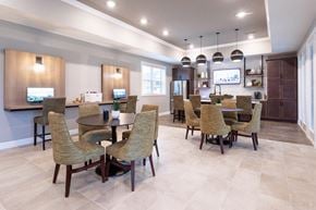 Commerce Township apartment for rent - A modern dining room with a large table and chairs.