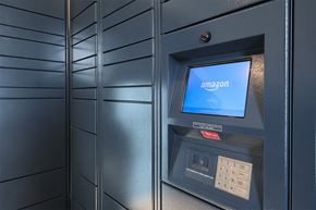 Brighton apartment for rent - A black Amazon vending machine with a blue screen.