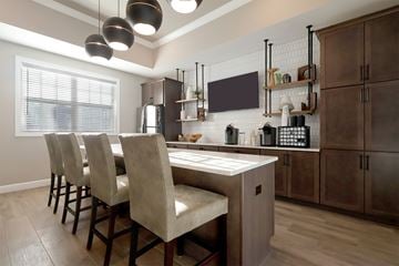 Commerce Township apartment for rent - A kitchen with a table and chairs.
