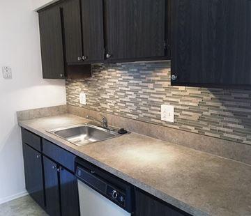Warren apartment for rent - A kitchen with a sink and cabinets.
