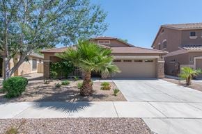 Queen Creek apartment for rent - a house with a palm tree in front of a driveway