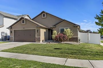 North Salt Lake apartment for rent - A house with a brown roof and a white garage door.