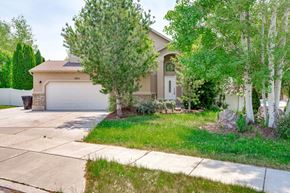 Clearfield apartment for rent - a house with a driveway and a garage door