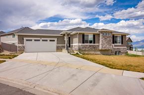 Saratoga Springs apartment for rent - a house with a driveway and a garage door