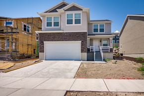 Saratoga Springs apartment for rent - a new house with a garage door in front of it