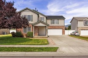 Clearfield apartment for rent - the front of a house with a driveway and a garage door