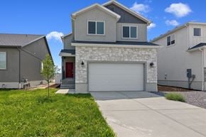 Eagle Mountain apartment for rent - A modern house with a red door and a garage.