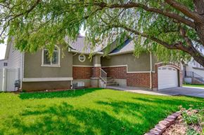 Clearfield apartment for rent - the front of a house with a lawn and a tree