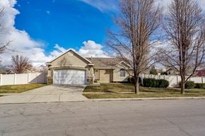 Layton apartment for rent - a house with a driveway and a garage door