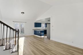 Lehi apartment for rent - an empty living room and kitchen in a house