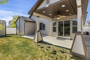 North Salt Lake apartment for rent - A house with a patio and a ceiling fan.