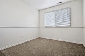 Provo apartment for rent - an empty room with carpet and a window