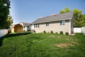 Clearfield apartment for rent - the back of a house with a yard and a barn