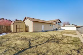 Roy apartment for rent - a house with a yard in front of it
