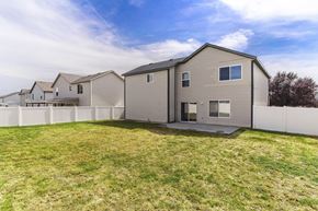 Clearfield apartment for rent - the backyard of a house with a yard and a fence