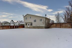 Clinton apartment for rent - a house with a yard covered in snow