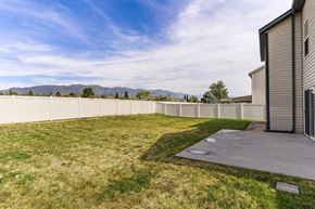 Clearfield apartment for rent - the backyard of a house with a yard and a fence