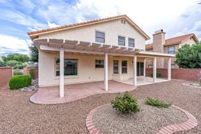 Oro Valley apartment for rent - a house with a porch and a gravel driveway