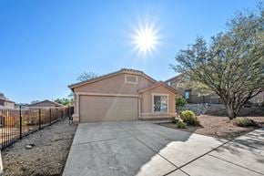 Vail apartment for rent - the front of a house with a sidewalk and a fence