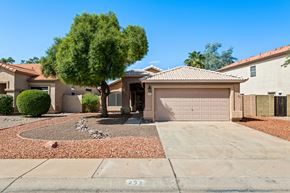 Gilbert apartment for rent - a house with a driveway and a garage door