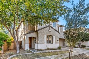 Gilbert apartment for rent - the exterior of a house with trees and a driveway