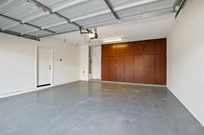 Gilbert apartment for rent - an empty room with white walls and wood cabinets