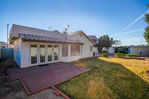 Mesa apartment for rent - a house with a yard and a blue sky