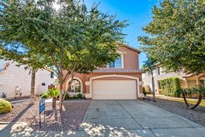 Mesa apartment for rent - a house with a driveway and a garage door