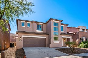 Sahuarita apartment for rent - a house with a garage door and a driveway