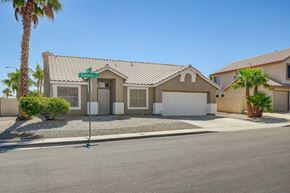 Henderson apartment for rent - A house with a green sign on the front.