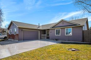 Meridian apartment for rent - a house with a driveway and a garage door