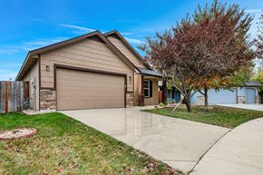 Meridian apartment for rent - the front of a house with a driveway and a garage door