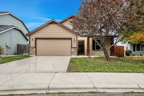Meridian apartment for rent - a house with a driveway and a garage door