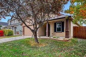 Meridian apartment for rent - a house with a yard and a tree in front of it