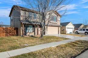 Meridian apartment for rent - a house with a driveway and a tree in front of it