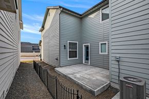 Meridian apartment for rent - the back of a house with a ramp to a patio