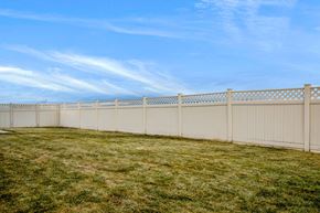 Kuna apartment for rent - A long white fence runs along a grassy field.