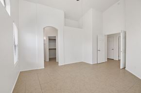 Oro Valley apartment for rent - an empty living room with white walls and a tiled floor