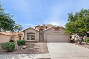 Oro Valley apartment for rent - a house with a driveway and a garage door