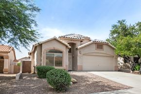 Oro Valley apartment for rent - a house with a driveway and a garage door