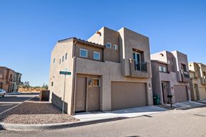 Vail apartment for rent - A modern house with a brown facade and a garage door.