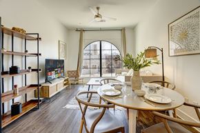 Nashville apartment for rent - a dining room with a table and chairs and a window