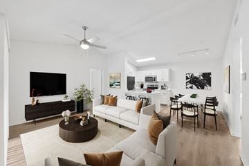 West Palm Beach apartment for rent - A living room with a white couch and a brown coffee table.